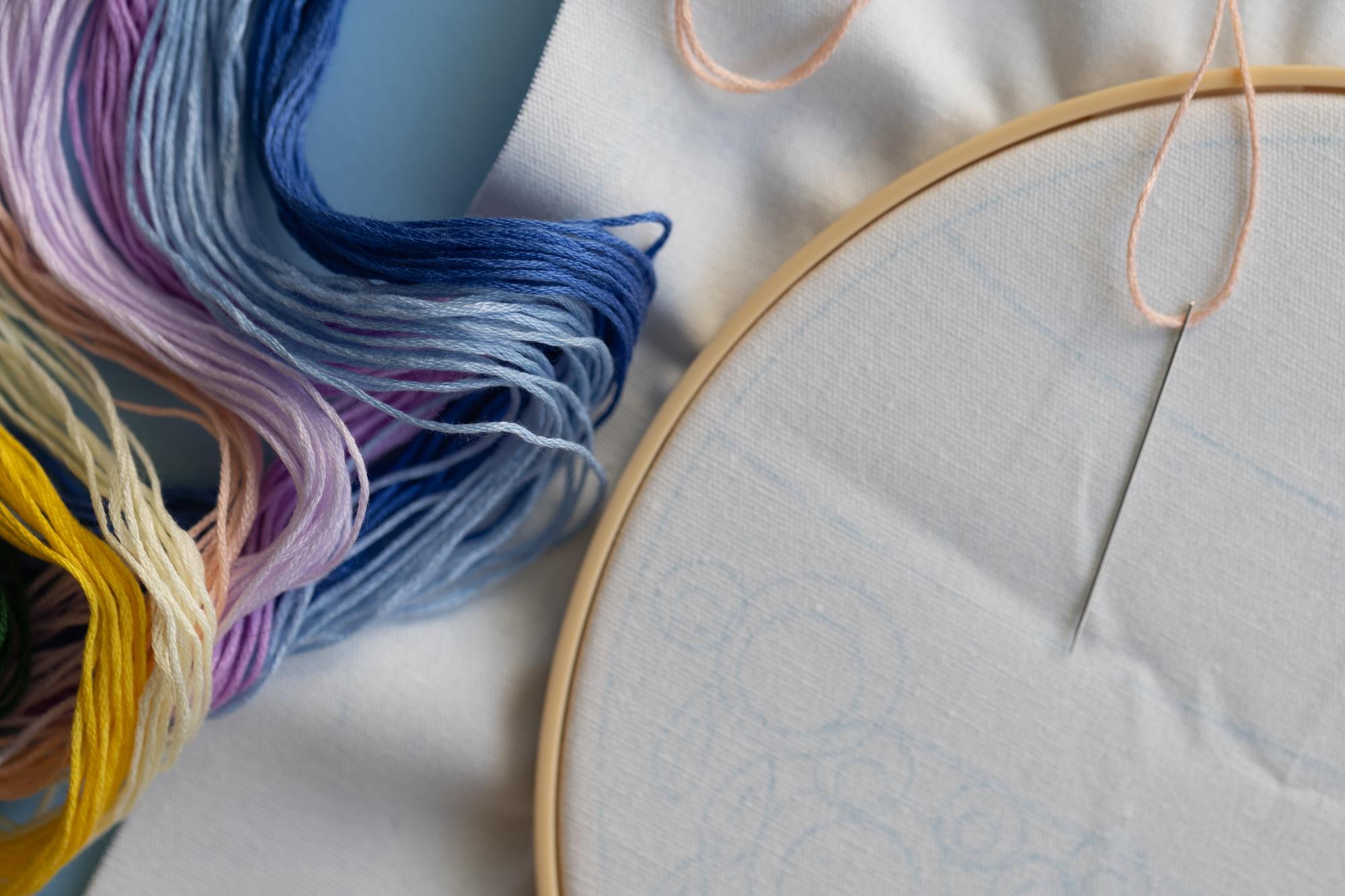 Large editorial composition of embroidered textiles